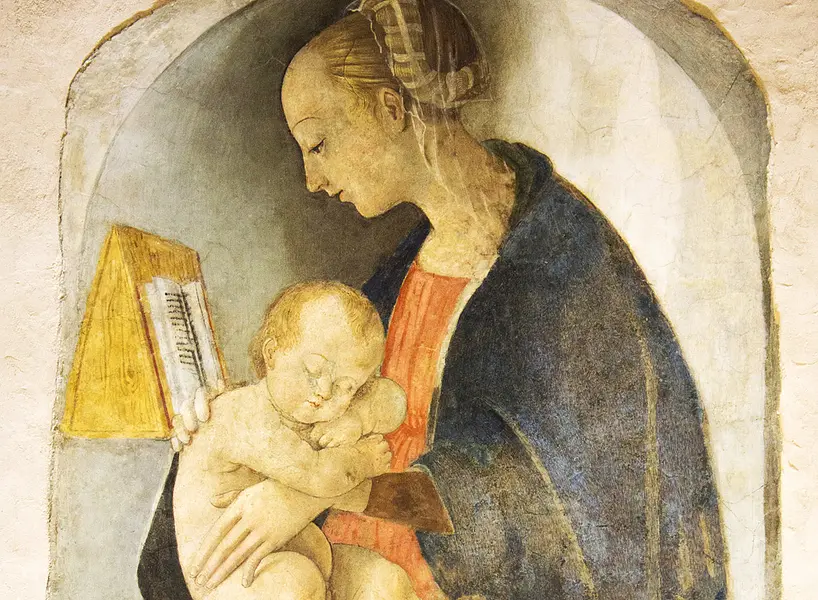 Urbino: la Madonna con bambino dormiente e Casa Santi 